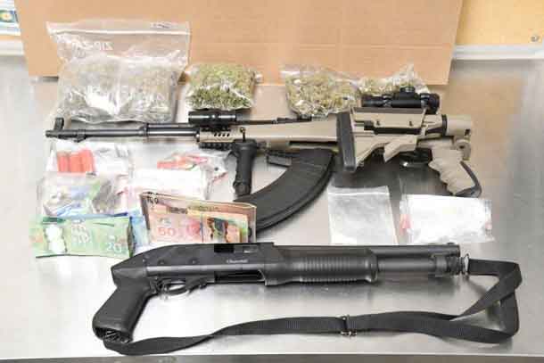 London Police and the RCMP seized drugs, cash and guns following a house fire