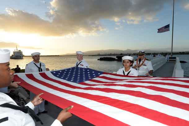 Members of the Joint Base Pearl Harbor Honor Guard fold the American flag during a double interment ceremony at the USS Utah Memorial during the 76th anniversary of the attacks on Pearl Harbor and Oahu at Joint Base Pearl Harbor-Hickam, Hawaii, Dec. 6, 2017. The 76th commemoration, co-hosted by the U.S. military, the National Park Service and the State of Hawaii, gave veterans, family members, service members and the community a chance to honor the sacrifices made by those who were present Dec. 7, 1941, and throughout the Pacific theater. Navy photo by Petty Officer 1st Class Randi Brown