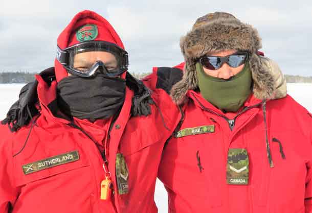 Rangers Derek Sutherland of Constance Lake First Nation, left, and Rodney Ray of Lac Seul First Nation bundle up against the cold. Photo by Sgt. Peter Moon