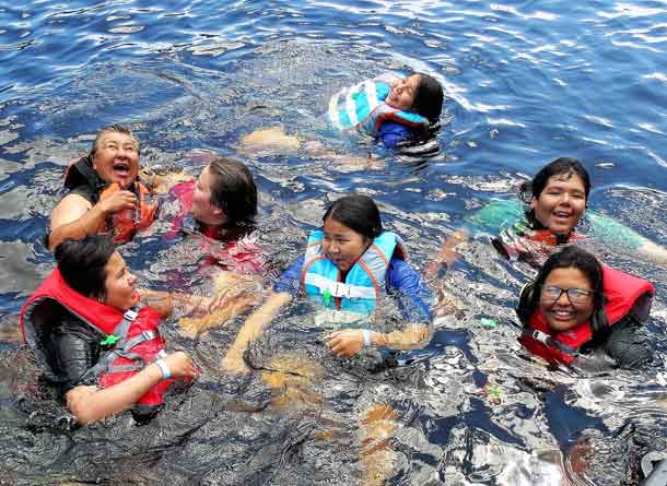 Junior Rangers enjoy cooling lake waters in high temperatures.