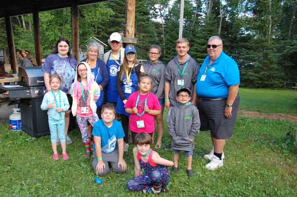 Our campers posing with Daytona’s and members of the Kiwanis Club who made our BBQ dinner!