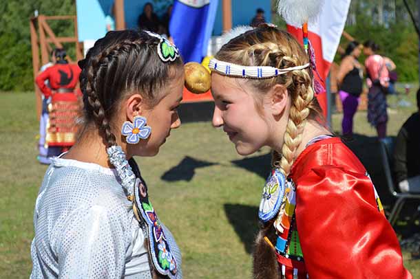 photo by Xavier Kataquapit  Jingle Dress Dancers from Mattagami FN taking part in a Pow Wow contest at the Eighth Annual Mattagami FN Pow Wow are L-R: Calee Boissoneau Hunter and Tessa Thomas. 