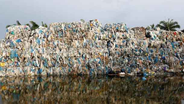 Plastic waste piled outside an illegal recycling factory in Jenjarom, Kuala Langat, Malaysia October 14, 2018. Picture taken October 14, 2018. REUTERS/Lai Seng Sin