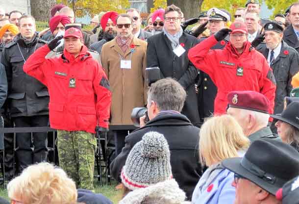 Master Corporals Angus Sutherland of Moose Factory and Donny Sutherland of Constance Lake salute during Remembrance Day ceremony in Toronto.