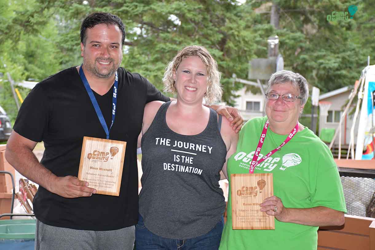 Vince Mirabelli (left) and Karen Miller (right) were presented with the Volunteer Extraordinaire Award by Camp Director Ashleigh.