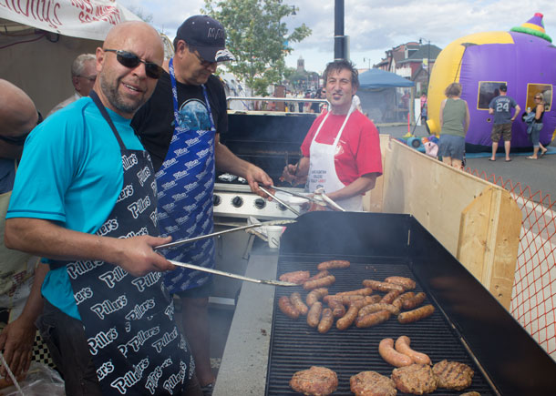 The men of St. Anthony Holy  Name Society are grilling up the tasty food!