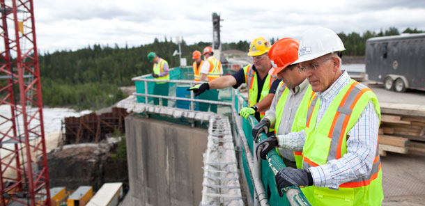 Minister Chiarelli overlooking the construction at Smokey Falls Generating Station in Lower Mattagami.