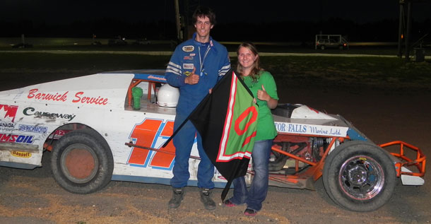 #17 Christopher Leek poses with Tasha McNally after winning the feature race in the WISSOTA Midwest Modifieds during the Keith McNally Memorial. Leek claimed his third championship in a row as well.