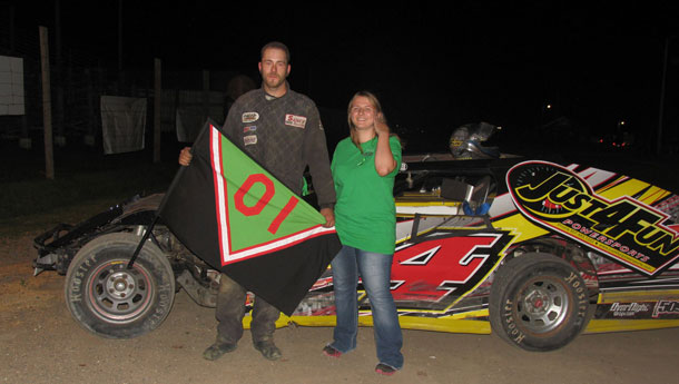 #4 Steve Nordin takes a picture with Tasha McNally after winning the WISSOTA Modified feature event.