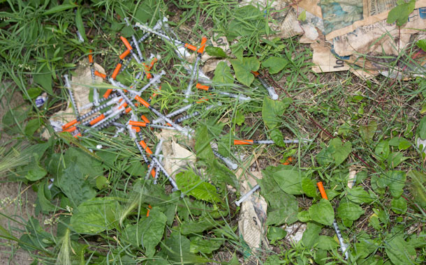 These syringes litter a walkway in the Fort William downtown. They are unused.