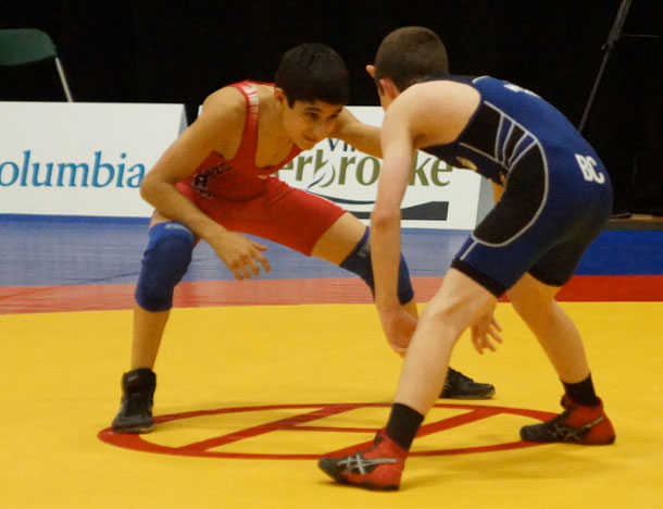 Marco grapples with his opponent from British Columbia