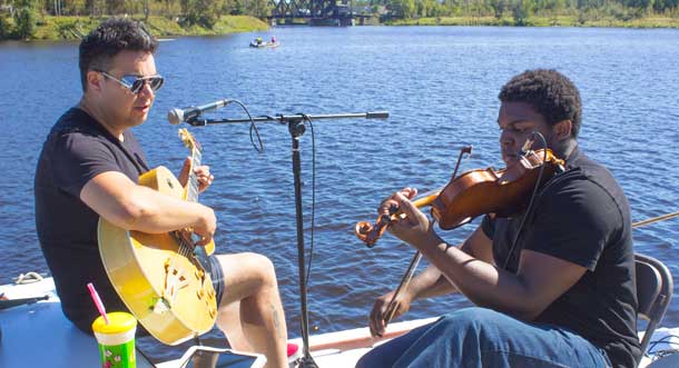 Music was aboard the Nina, a small motor cruiser owned by Paul Morralee a Kam River Park enthusiast