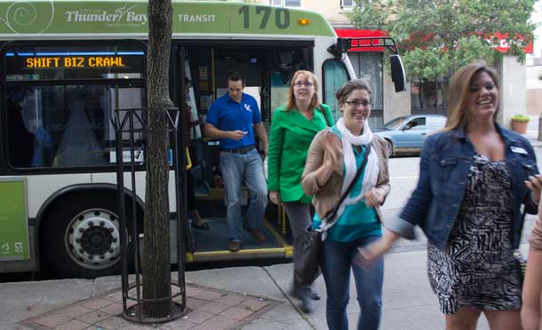 Travelling in style in a Thunder Bay Transit bus the Shift Network head into Unveiled Bridal Boutique on Victoria Avenue East