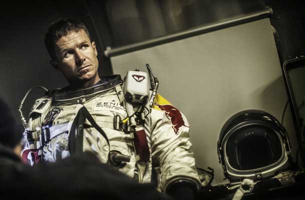 Nothing in Felix Baumgartner’s career had ever been quite like the challenge of Red Bull Stratos. In this image, he is helped with the 100 pounds of equipment he wore on every flight by the team’s life support engineer, Mike Todd. Photo - Red Bull Content Pool