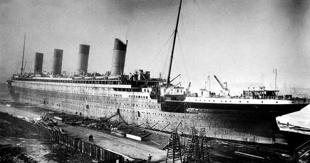 The RMS Titanic under construction. The ship, considered unsinkable hit an iceberg and sunk in 1912 with 1547 people being lost.