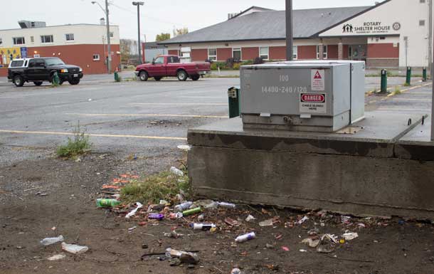 Hairspray and mouthwash bottles along with syringes litter the back alleys