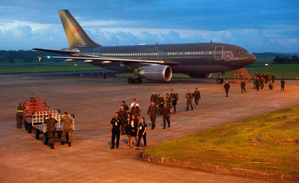  A Royal Canadian Air Force CC-150 Polaris aircraft with members of the Canadian Armed Forces Disaster Assistance Response Team (DART) onboard arrives in Iloilo city airport during Operation RENAISSANCE, in Iloilo city, Philippines on November 16, 2013.  Photo : MCpl Marc-Andre Gaudreault, Canadian Forces Combat Camera