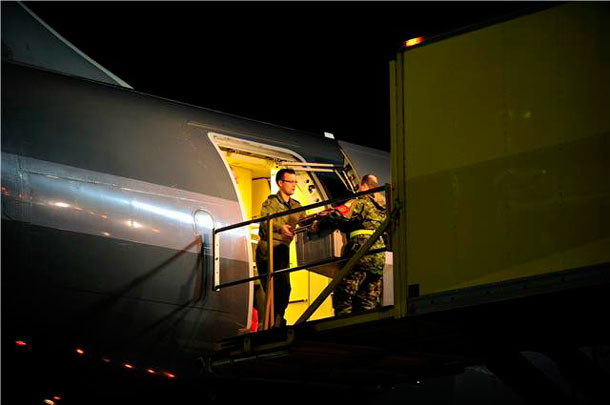 Crew members load food and other items onto a CC-150 Polaris Airbus that will carry members of a Disaster Assistance Response Team (DART), to the Philippine Islands that were ravaged by Typhoon Haiyan, at Canadian Forces Base Trenton, Ontario on November 14, 2013. Photo: MCpl Patrick Blanchard, Canadian Forces Combat Camera