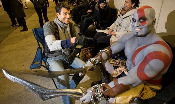 Nathan Drake and Kratos take a break while lining up at Best Buy in Toronto for the launch of PlayStation 4.