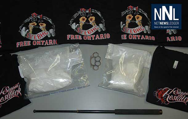 Two bags of cocaine, one set of brass knuckles, one extendable baton and numerous black shirts - RCMP Image
