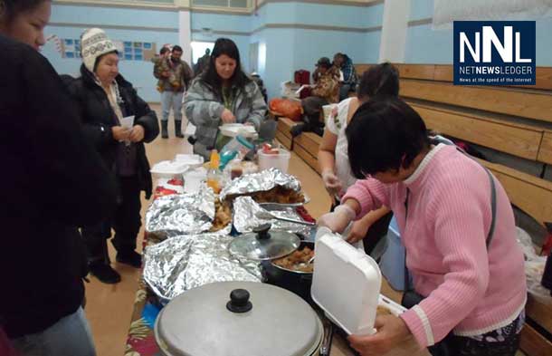 After the parade, the community of Attawapiskat gathered for fellowship and food. Photo by Rosiewoman Cree.