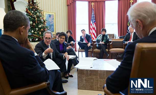 President Barack Obama and Vice President Joe Biden meet with U.S. Trade Representative Mike Froman and Commerce Secretary Penny Pritzker in the Oval Office, Dec. 16, 2013. (Official White House Photo by Pete Souza)