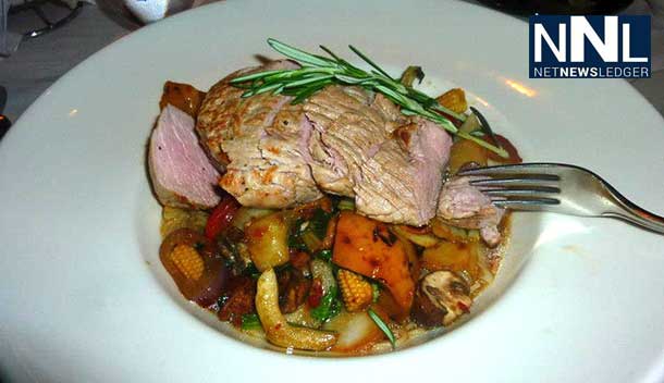 Grilled Marinated Pork Tenderloin on an Asian Style Vegetable Noodle Bowl