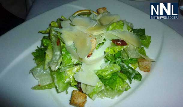 Bistro's Caesar Salad with Bacon, Seasoned Croutons and Shaved Parmeggiano
