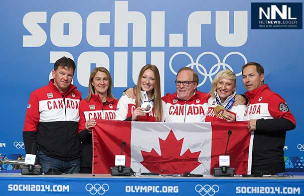 The Canadian Olympic Team will be led into the closing ceremonies by a pair of athletes.
