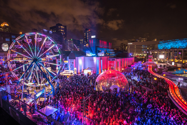 Over its 10-day run, the Montreal High Lights festival attracts hundreds of thousands of visitors to a smorgasbord of events, including a downtown festival plaza featuring everything from free art exhibits and concerts to a Ferris wheel. Photo: Montréal en Lumière/Frédérique Menard-Aubin.