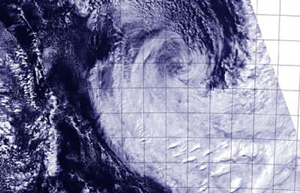 This visible image of an elongated Tropical Cyclone Ita was taken from the VIIRS instrument aboard NASA-NOAA's Suomi NPP satellite on April 15 at 3:53 UTC and shows that wind shear has blown most clouds and thunderstorms south of the center. Credit: Image Credit: NRL/NASA/NOAA