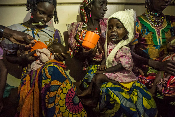 Malnourished children from Central African Republic at feeding time with their mothers in Batouri Hospital, Cameroon. Photo: UNHCR/F. Noy