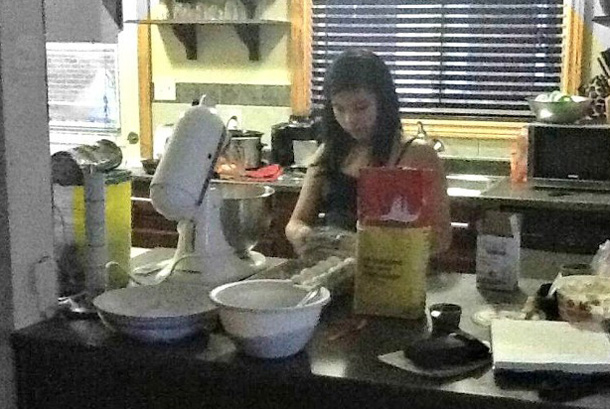 The picture is a bit grainy as I used the laptop to take an impromptu picture of Kyleigh in her element. My daughter loves to bake. I remember as a young child, her favourite channel to watch was the cooking channel - no kids shows for her then. She'd much rather watch people cooking and baking.