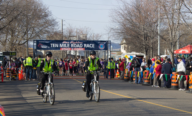 Keeping all the runners safe. St. Johns Ambulance riders follow the race.