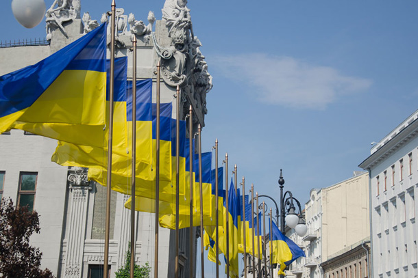 Ukrainian flags in front of the House with Chimaeras, Kyiv. Photo: UNDP Kyiv