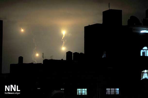 Israeli forces' flares light up the night sky of Gaza City on early Tuesday, July 29, 2014. UN Photo/Shareef Sarhan