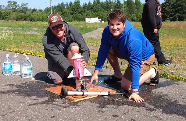 Assistant Camp Coordinator, Mark Shruiff (left) and Camp Participant, Mark Ehrenfellner Get Ready to Launch Their Homemade Bottle Rocket