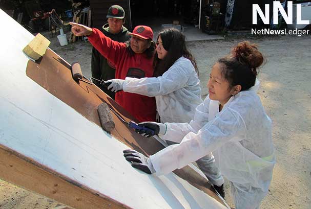 Junior Rangers painting equipment in MacLeod Provincial Park