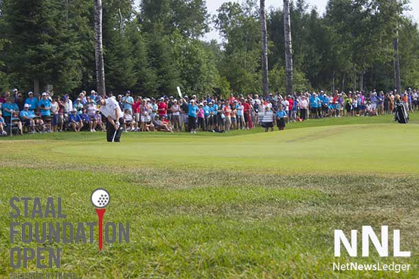 The players were followed by huge galleries of avid golf fans.