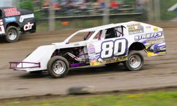 #80- Don Scholler made it back to back feature wins at two tracks in the WISSOTA Midwest Modifieds, having won at Hibbing Raceway last week, and a clean sweep at Emo Speedway on Saturday. (Photo by Kaz Graphix) 