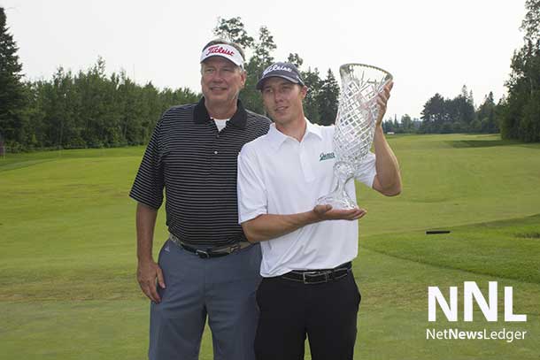 Wes Horman with his dad and the Staal Foundation Open trophy.