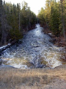 View looking downstream.  On May 10, the spring flood overflows the banks.  