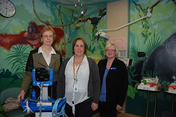 Heidi Liimatainen (right), Manager of Wealth Management and Business Development with the Provincial Alliance Credit Union, and Audrey Halvorsen (left), Vice President of Operations with the Northern Lights Credit Union were given a demonstration of how the paediatric vital signs monitor works by Christina Purdon, Manager of Paediatrics and Neonatal Intensive Care. The much needed monitor is the first piece of equipment to be purchased with income from the Thunder Bay Credit Union Endowment Fund.  