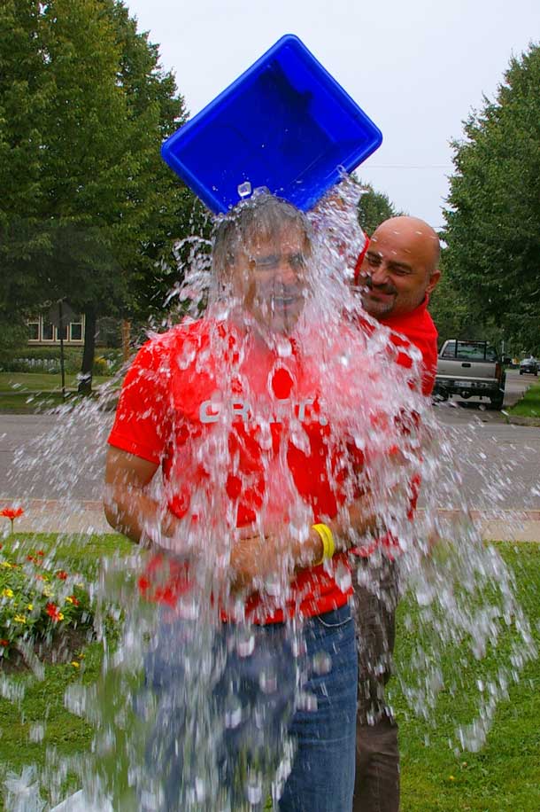 Thunder Bay Atikokan MPP and Minister of Natural Resources and Forestry Bill Mauro gets the Ice Bucket Challenge treatment from his brother.