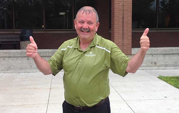 President Jim Madder is all smiles after being doused with ice cold water in support of ALS