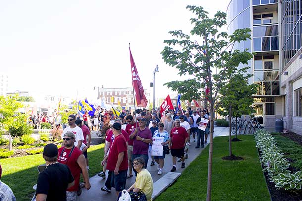 Striking Unifor Workers rally at City Hall