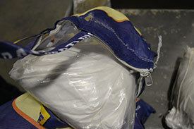 RCMP Image of white powder pulled from bag of rice