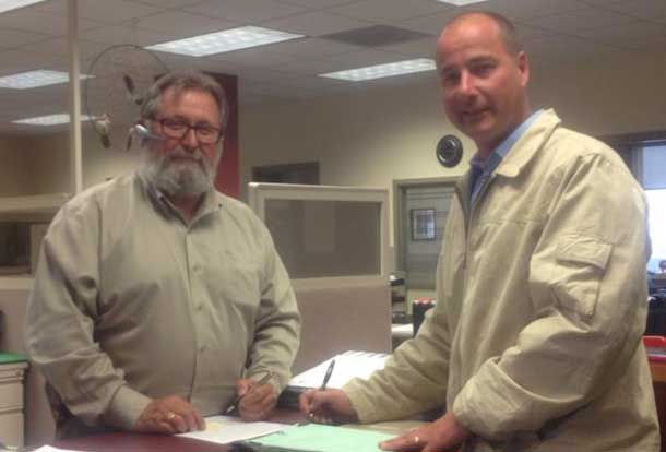 Andrew Foulds filing his papers with Thunder Bay City Clerk John Hannam