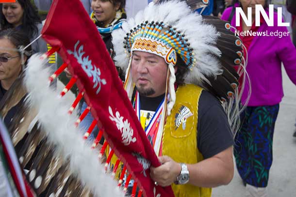 Assembly of Manitoba Grand Chief Derek Nepinak walking in the Full Moon Memory Walk