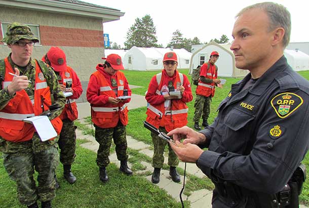 OPP Constable John Meaker teaches search and rescue techniques to Canadian Rangers - Photo by Sergeant Peter Moon, Canadian Rangers